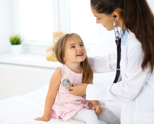 Doctor,Examining,A,Little,Girl,By,Stethoscope