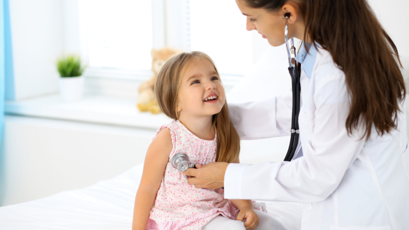 Doctor,Examining,A,Little,Girl,By,Stethoscope