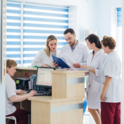 Doctor,And,Receptionist,At,Reception,In,A,Hospital