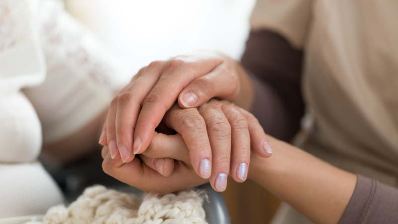 Close-up,Photo,Of,A,Female,Caregiver,And,Senior,Woman,Holding