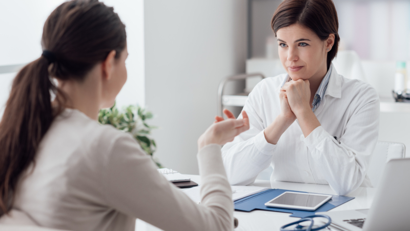 Doctor,Working,In,The,Office,And,Listening,To,The,Patient,