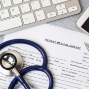 Stethoscope,Lying,On,Patient,Medical,History,Form.,Therapist,Working,Table.