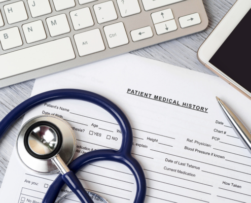 Stethoscope,Lying,On,Patient,Medical,History,Form.,Therapist,Working,Table.