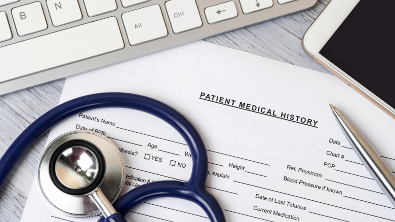Stethoscope,Lying,On,Patient,Medical,History,Form.,Therapist,Working,Table.