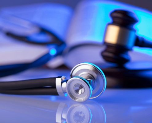 Medical,Law,Concept.,Gavel,,Stethoscope,,Blue,Light.,Place,For,Text.