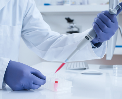 Scientist,Processing,Dna,Sample,In,Laboratory,Selective,Focus